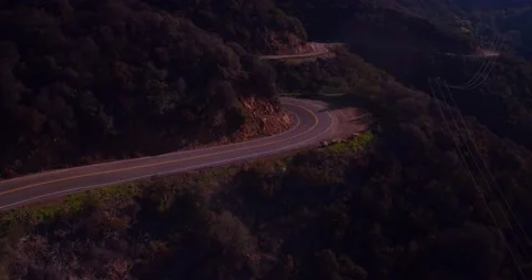 Landscape view of empty winding mountain road Stock Footage 136340748