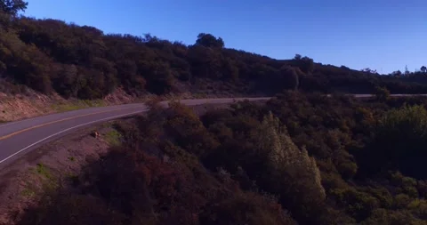 Landscape view of empty winding mountain road Stock Footage 136341283