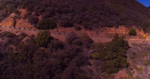 Landscape view of empty winding mountain road Stock Footage 136341612