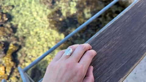 Landscape view of engagement ring hand by Adriatic coast in Croatia Stock Footage 319693638