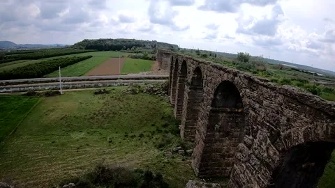 Landscape view of the fields and hills next to an ancient bridge, Turkey Stock Footage 161027605