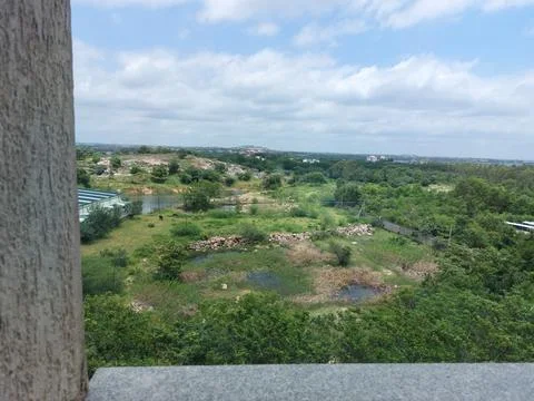 Landscape view of forest and sky from building Stock Photos