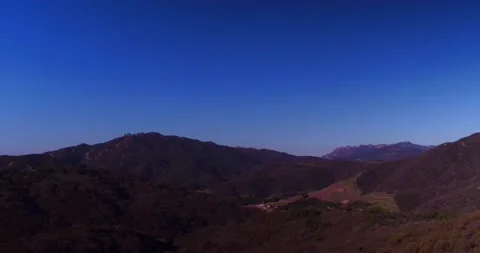 Landscape view of forest mountains at sunset Stock Footage 136340941