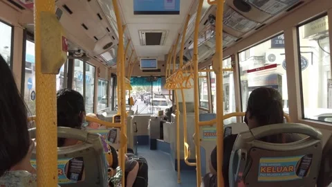 Landscape view inside public transportation bus full with passenger with st.. Stock Footage 311055935