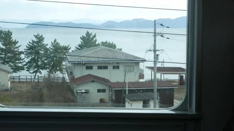 Landscape view inside train commuter through train window with view of loca.. Stock Footage 328102148