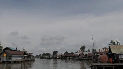 Landscape view of Kuin river and Tajau village in Banjarmasin Stock Footage 106641517