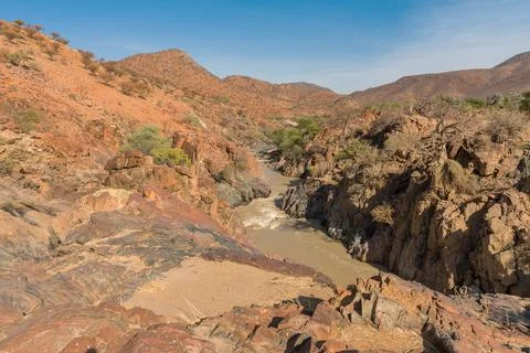 Landscape view of the Kunene River, the border river between Namibia-Angola Stock Photos
