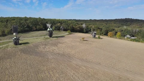 Landscape view. Mills and brown fields. 库存影片 163089593
