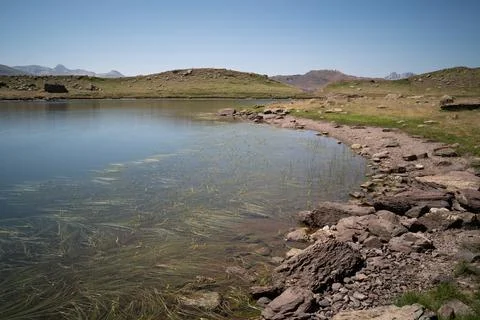 Landscape view of a mountain lake in the pyrenees Stock Photos
