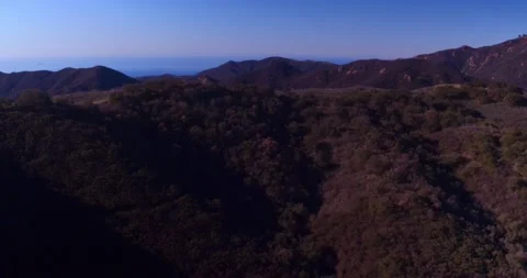 Landscape view of mountain valleys at sunset Stock Footage 136341038