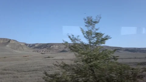 Landscape view of mountain from the window inside a train with some reflections. Stock Footage 124639238