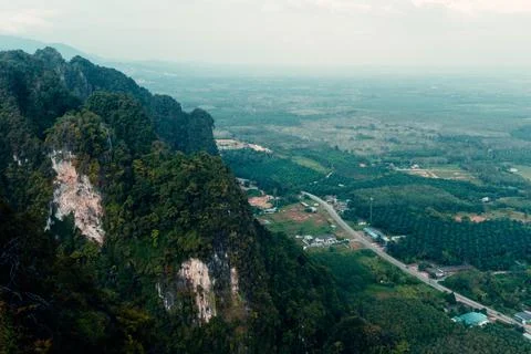 Landscape view on mountains and fields with vegetation, from Tiger Cave Tem.. Stock Photos