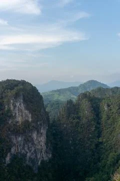 Landscape view on mountains and fields with vegetation, from Tiger Cave Tem.. Foto stock
