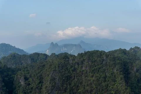 Landscape view on mountains and fields with vegetation, from Tiger Cave Tem.. Stock Photos