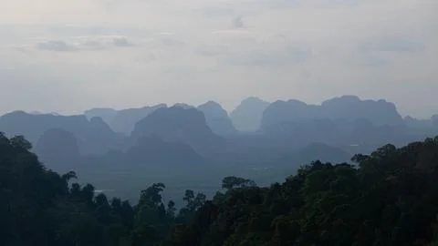 Landscape view on mountains and fields with vegetation, from Tiger Cave Tem.. Stock Photos