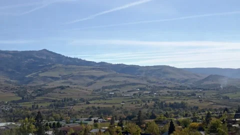 Landscape View Of Mountains - Traffic in Foreground Stock Footage 154385888