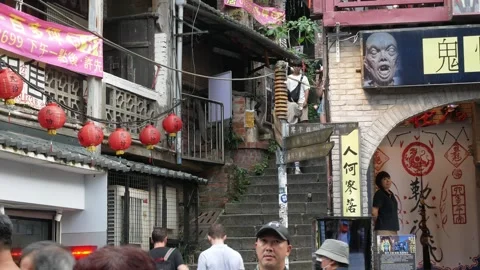 Landscape view of people while walking at walking shopping street in jioufe.. Stock Footage 259606483
