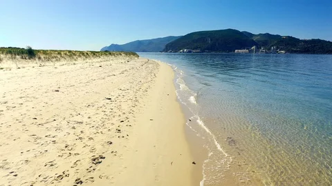 Landscape View of the perfect desert sandy beach with transparent sea water Stock Footage 130140123