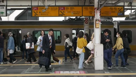 Landscape view at platform JR train station with passenger waiting for arri.. Stock Footage 317222789