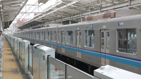 Landscape view at platform of Metro train public transportation train of To.. Видео 331305259