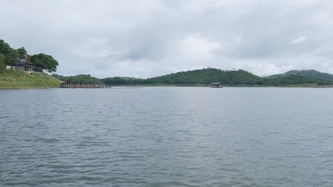 Landscape view of river and mountain and boat in Kanchanaburi Stock Footage 79250617