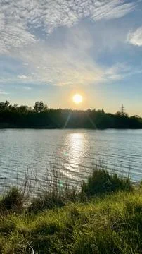 A landscape with a view of the river and the sunset Stock Photos