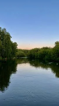 A landscape with a view of the river and the sunset Stock Photos
