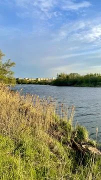 A landscape with a view of the river and the sunset Stock Photos