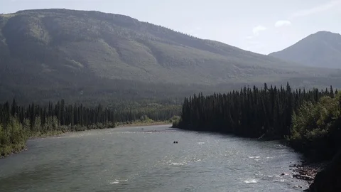 Landscape view of a river passing through a valley by a forest Video stock 92363676