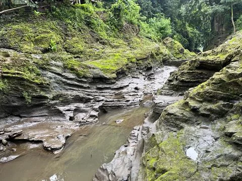 Landscape view of river valley featuring water stream Stock Photos