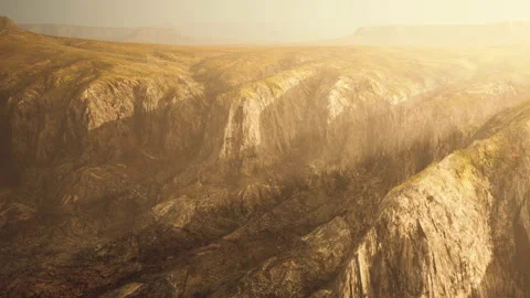 Landscape view of rocky terrain with sun rays during day Stock Footage 340606267