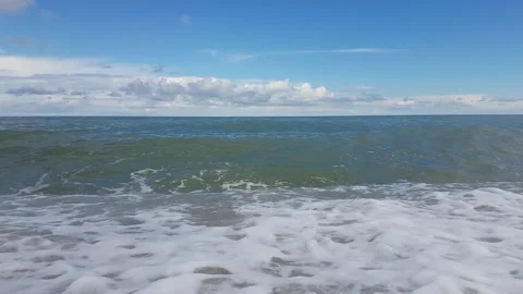 Landscape - view of the sea, beach and blue sky with beautiful white clouds Stock Footage 156701309