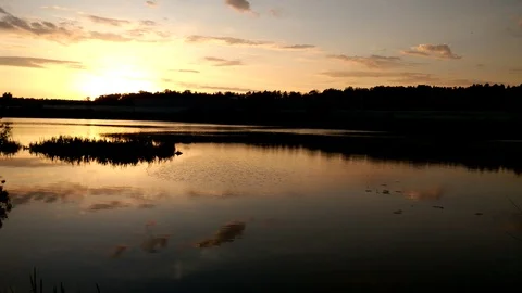 Landscape view of sunset on the lake 4K nature Video stock 107959397