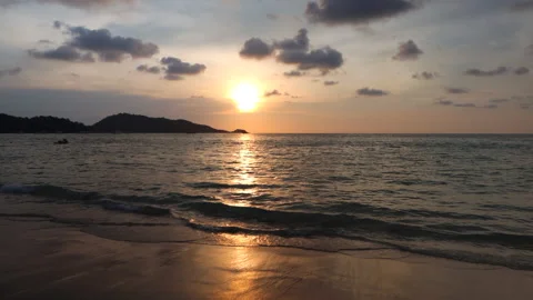 Landscape view of sunset in the sea on Phuket beach. Phuket, Thailand Stock Footage 145456740