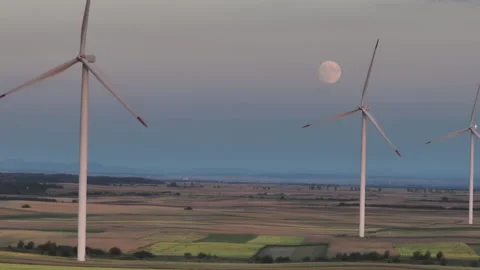 Landscape view of wind turbines spinning Stock Footage 210765699
