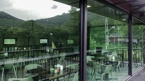 Landscape view from the window for relaxing time, green nature beside the win Stock Photos
