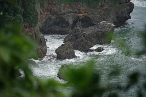 Landscape views of cliffs and waves crashing into the reef. Very dangerous .. Stock Photos