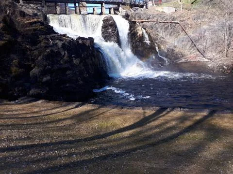 Landscape with water falling down Stock Photos