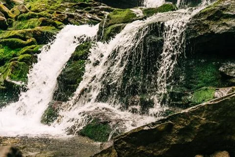 Landscape of the waterfall in the Mountains Stock Photos