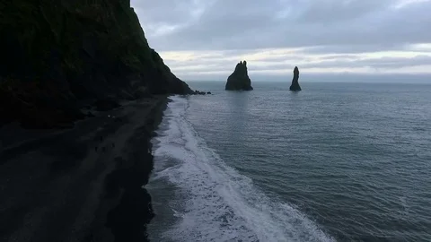 Landscape of waves on the beach with black volcanic sand. Andreev. Stock Footage 78211158