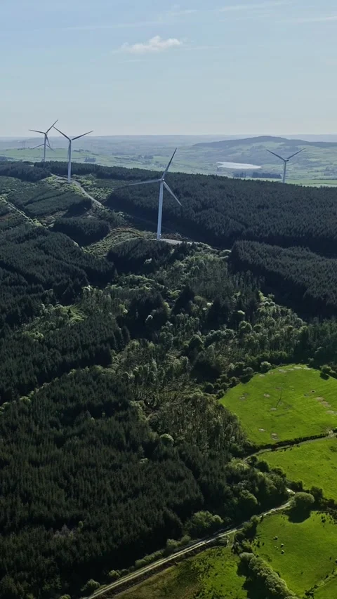 Landscape with wind power generators and patchwork agricultural fields. Stock Footage 325053760