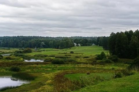 Landscape with a windmill. Stock Photos