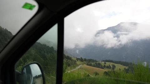 Landscape from the window of a van in the mountains Stock Footage 297792423