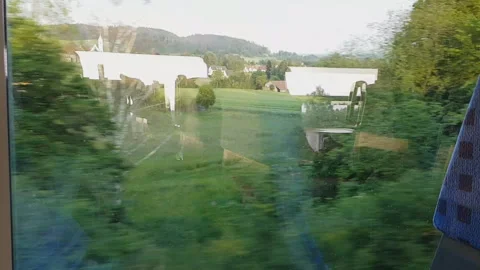 Landscape from window view of a moving train in Germany Stock Footage 91171649
