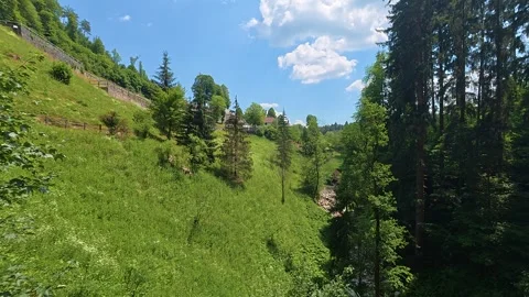 Landscaped grounds surrounding Predjama Castle, Slovenia Video stock 338091906