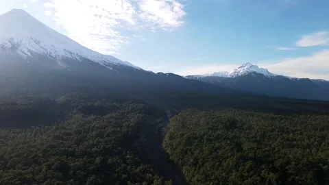 Landscapes large volcano with forests panoramic dron at height backlit sunlight Stock Footage 292315528