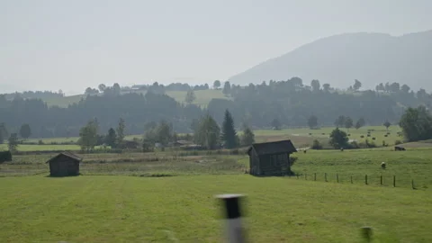 Landscapes seen from the car window while driving through alpine mountain roads 库存影片 343737063