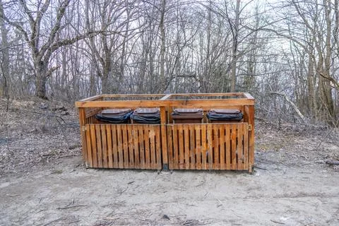 Landscaping waste management solution in the forest, trash bins Fotos Stock