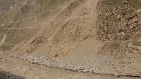 LANDSLIDE AND WATER EXITING A HYDRO TAIL RACE TUNNEL Stock Footage 117176943