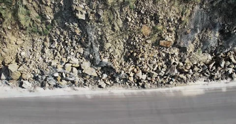 Landslide, rockfall on the road in the mountains Stock Footage 296071448